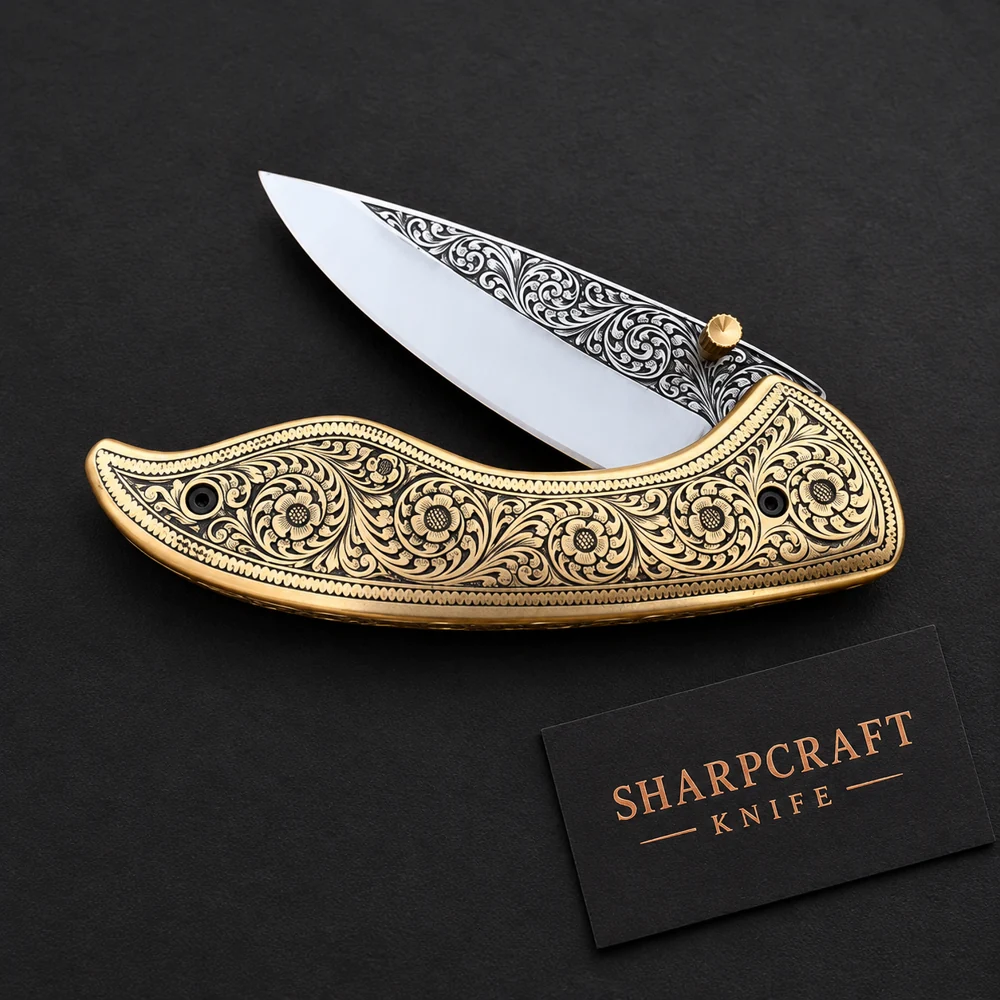 Brass Tone Engraved Folding Knife on black with Sharpcraft Knife card
