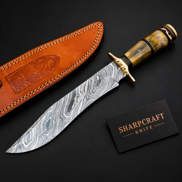 Damascus Bowie Knife Bone Brass on a black background with Sharpcraft Knife card