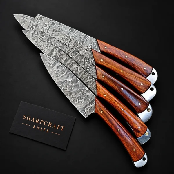 Damascus Chef Steak Set Rosewood on a black background with Sharpcraft Knife card