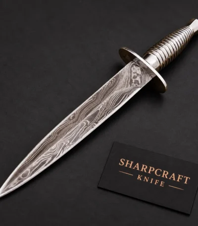 Damascus Dagger with Ribbed Metal Handle — main product view on black with Sharpcraft Knife card
