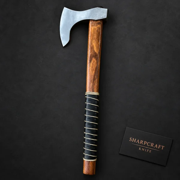 Wood Handle Bearded Axe photographed on black with a Sharpcraft Knife visiting card